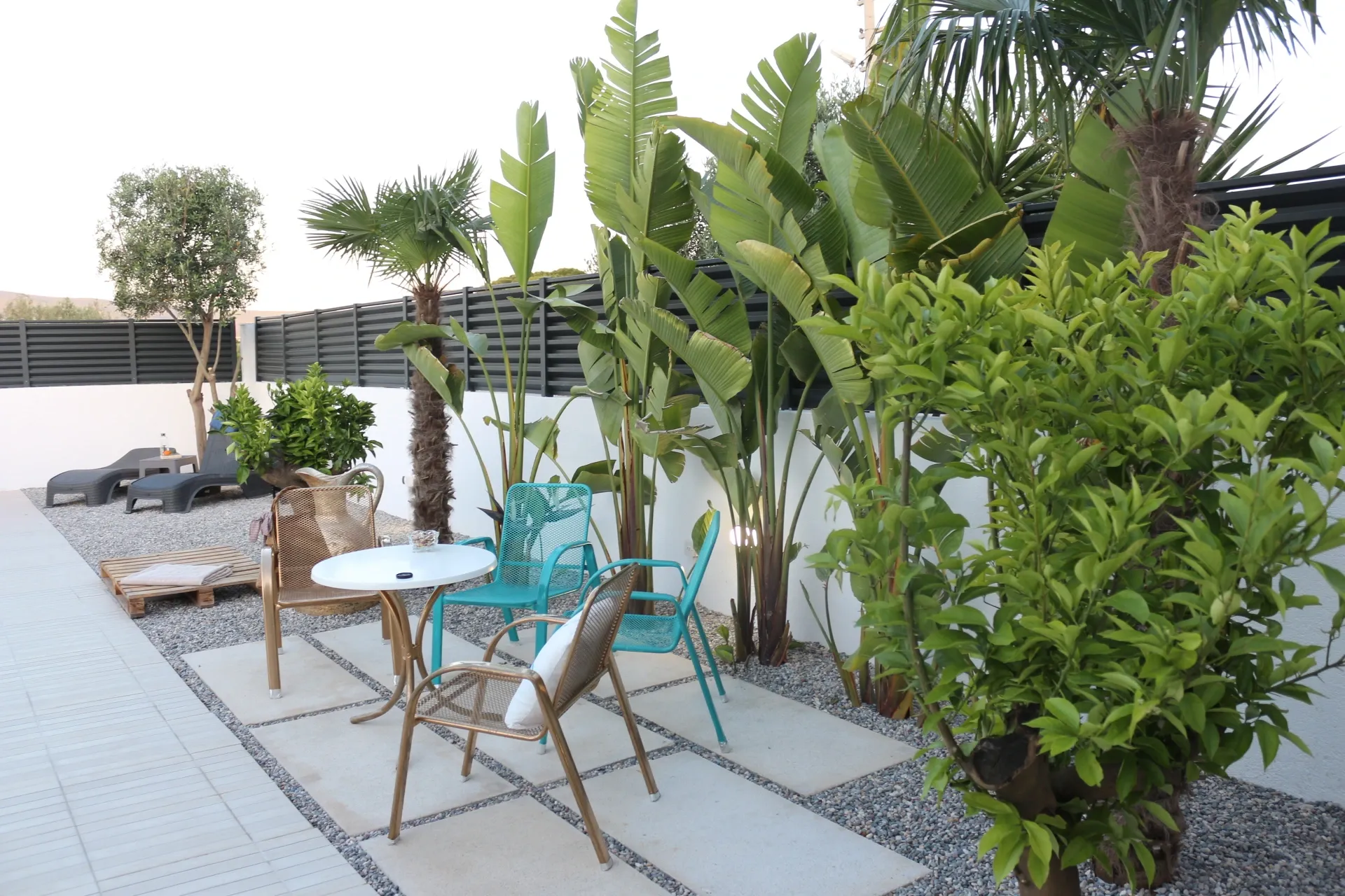 Comfortable shaded patio dining setup during the day