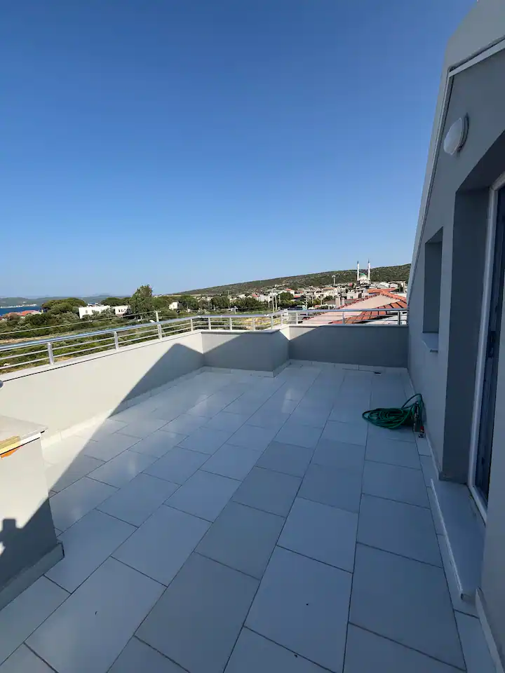 Spacious roof terrace with relaxing coastal views