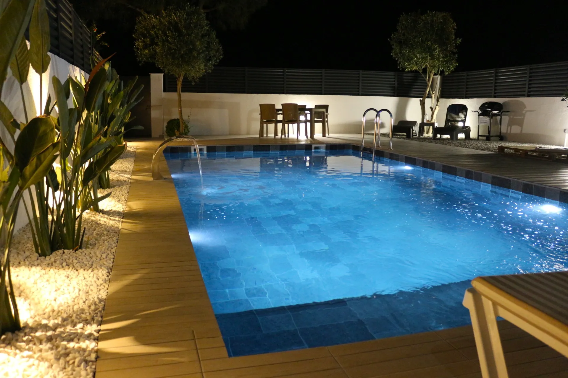 Villa Öz private pool illuminated at night with ambient lighting