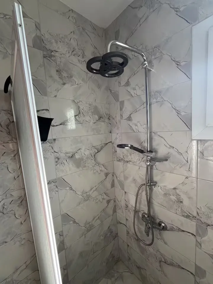 Bathroom details featuring the shower stall