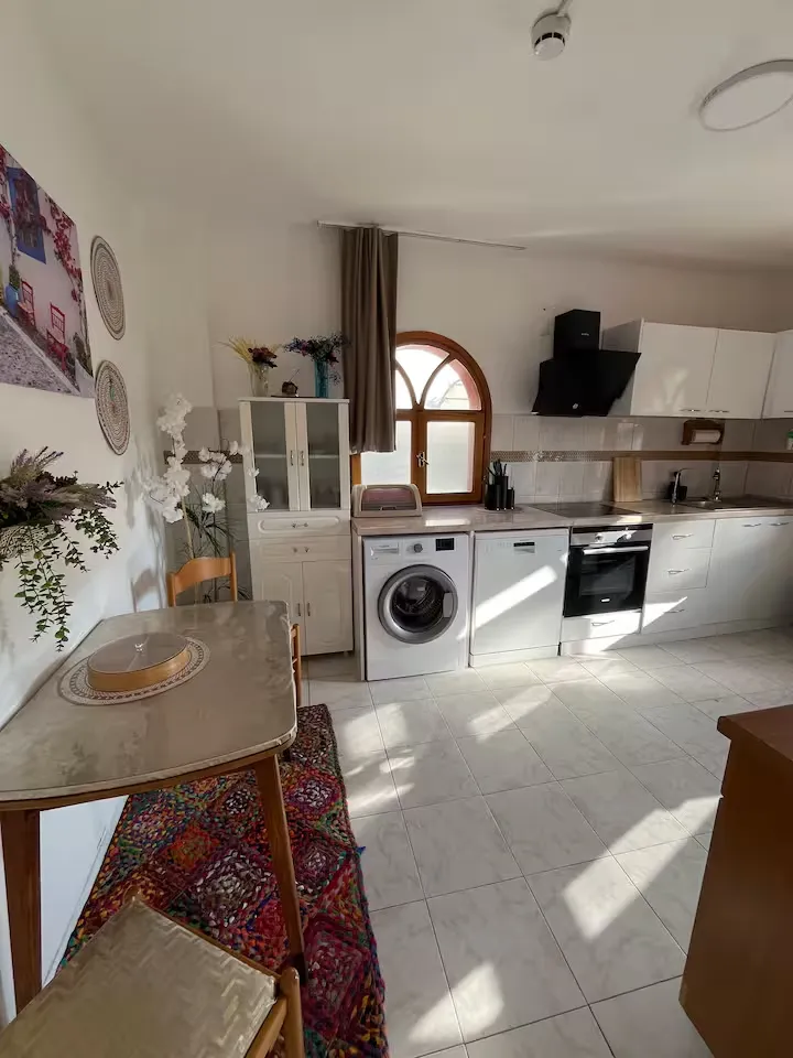 Double bed decorated with art in the bedroom