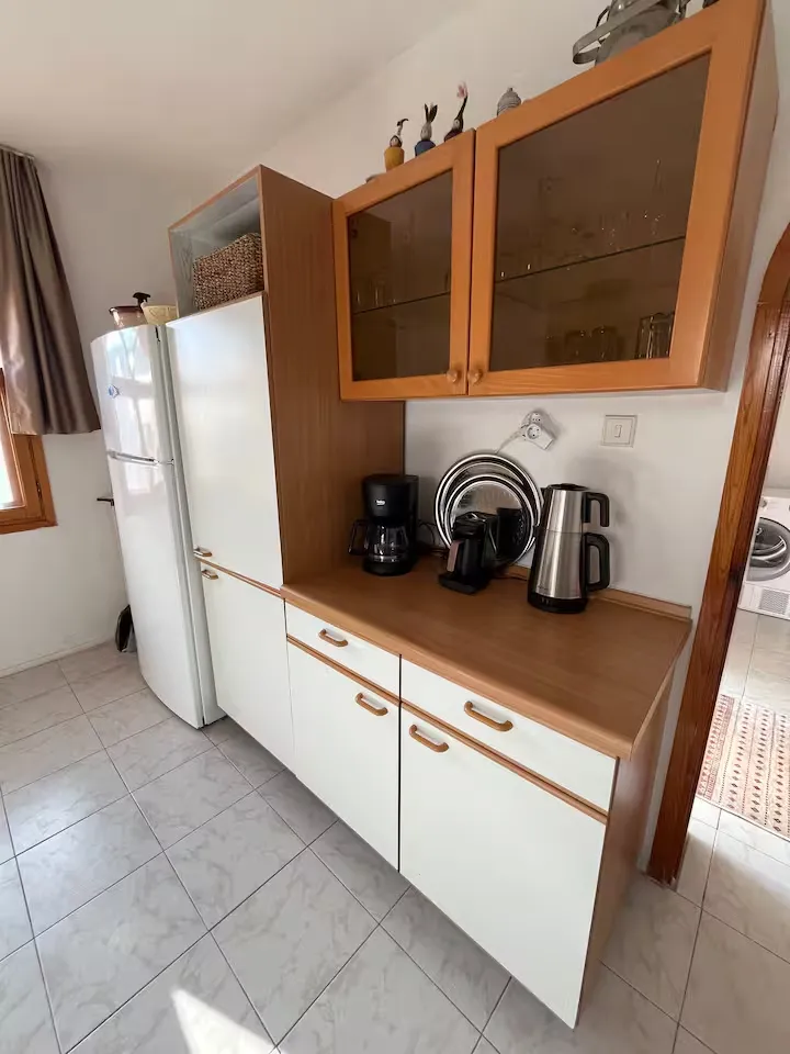 Kitchen area with coffee maker and appliances